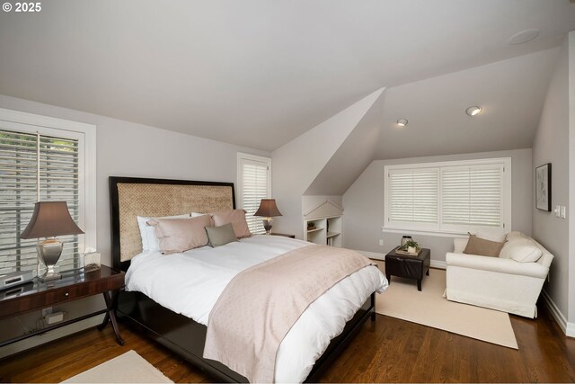 2892 NW Beuhla Vista Ter, Portland, OR 97210 - bedroom featuring vaulted ceiling, wood finished floors, and baseboards