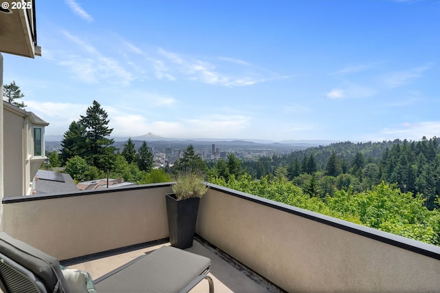 2892 NW Beuhla Vista Ter, Portland, OR 97210 - balcony with a wooded view and a mountain view