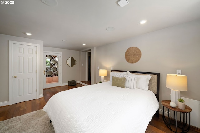 2892 NW Beuhla Vista Ter, Portland, OR 97210 - bedroom featuring wood finished floors, recessed lighting, and baseboards