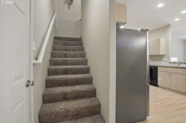 1639 SW 171st Ter, Beaverton, OR 97003 - stairs featuring recessed lighting and wood finished floors