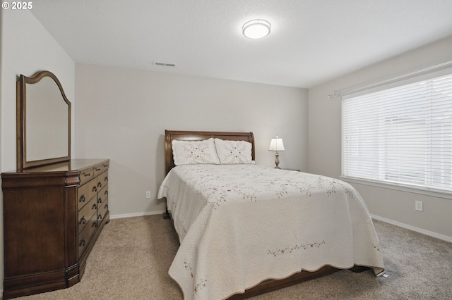1639 SW 171st Ter, Beaverton, OR 97003 - bedroom featuring light carpet, visible vents, and baseboards