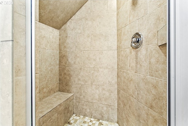 13616 SE Rhine St, Portland, OR 97236 - bathroom featuring a tile shower and lofted ceiling