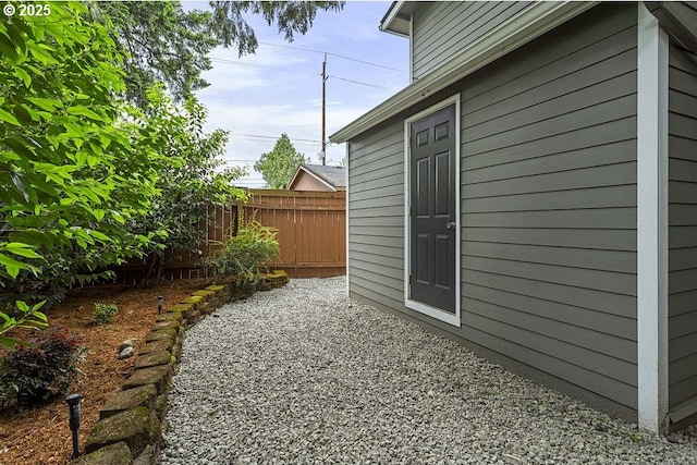 13616 SE Rhine St, Portland, OR 97236 - view of side of property with a patio area