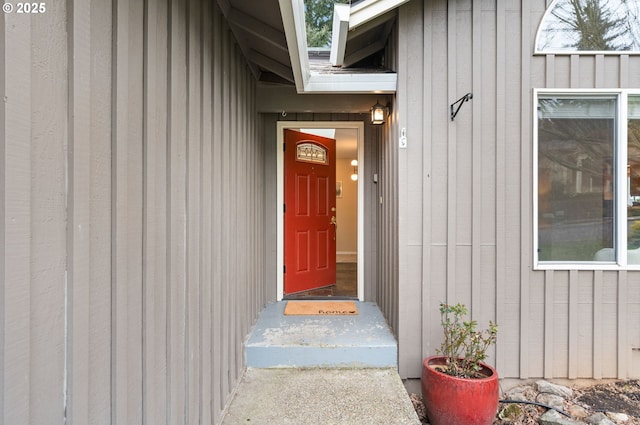 doorway to property with board and batten siding