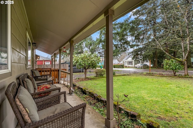 view of patio with a porch and an outdoor hangout area