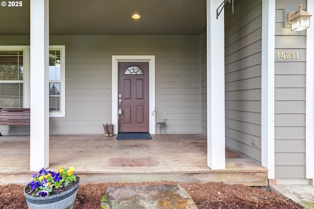 entrance to property with a porch