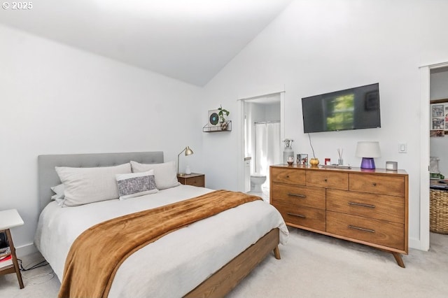 10272 NW Edgewood Dr, Portland, OR 97229 - bedroom featuring light carpet, high vaulted ceiling, and ensuite bath