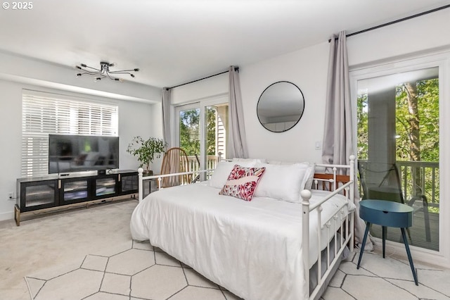 10272 NW Edgewood Dr, Portland, OR 97229 - bedroom featuring access to outside and light carpet