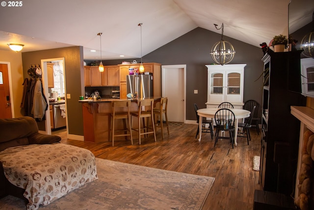 interior space featuring an inviting chandelier, lofted ceiling, and dark hardwood / wood-style floors