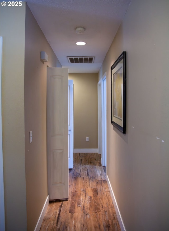 hall featuring hardwood / wood-style floors