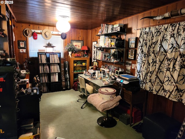 home office with wood ceiling and wood walls