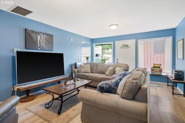 living area with wood finished floors
