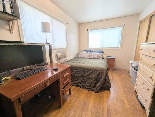 bedroom with light wood-style floors