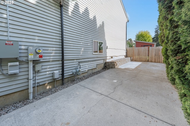 view of patio / terrace featuring fence