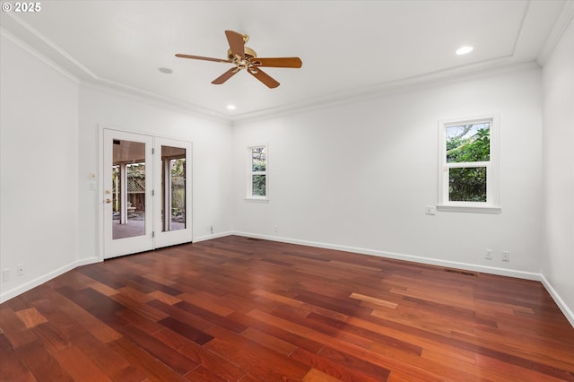 unfurnished room featuring crown molding, ceiling fan, dark hardwood / wood-style flooring, and french doors