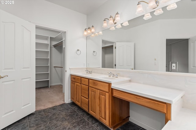 bathroom with vanity and tile patterned flooring