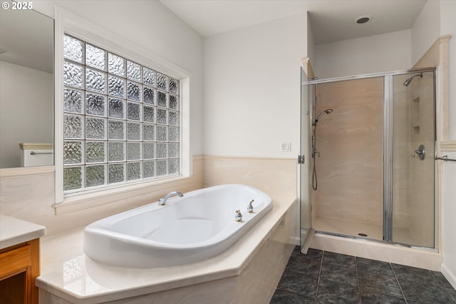 bathroom with tile patterned flooring and plus walk in shower