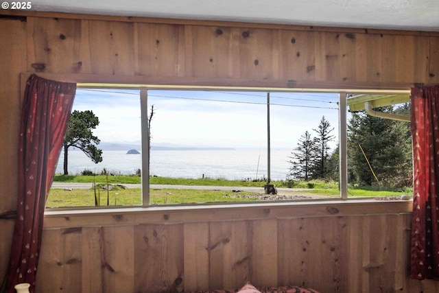 255 Coast Guard Hill Rd, Port Orford, OR 97465 - interior space with wooden walls and a water view