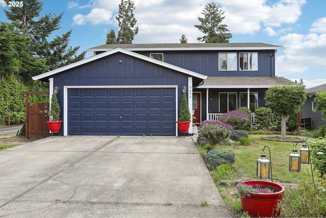 3490 Midway Ave NE, Salem, OR 97301 - traditional home featuring a shingled roof, driveway, an attached garage, and a front yard