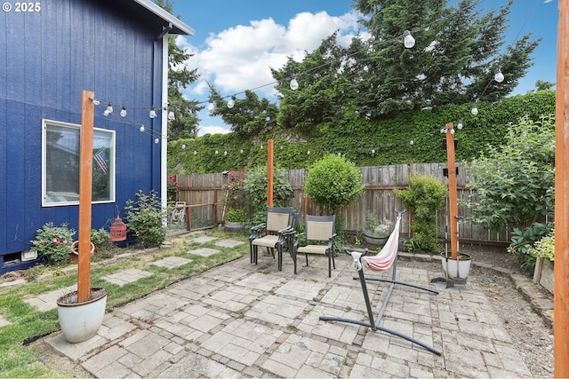 3490 Midway Ave NE, Salem, OR 97301 - fenced backyard with a patio area