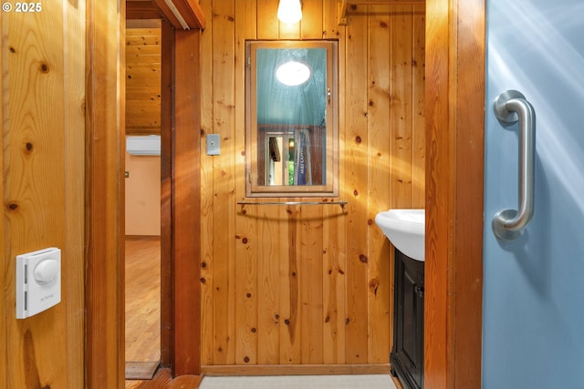 91625 W Fork Rd, Deadwood, OR 97430 - bathroom featuring wooden walls and vanity
