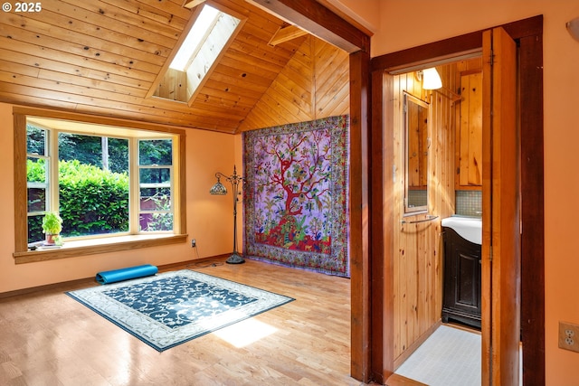 91625 W Fork Rd, Deadwood, OR 97430 - entryway featuring vaulted ceiling, a skylight, wood finished floors, and wood ceiling