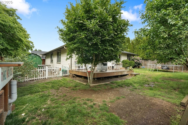 12705 NE 101st St, Vancouver, WA 98682 - view of yard with a trampoline and a wooden deck