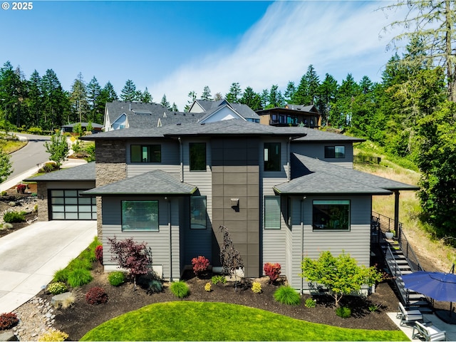 967 S 66th Pl, Springfield, OR 97478 - view of front of home featuring stairway, roof with shingles, a garage, and driveway