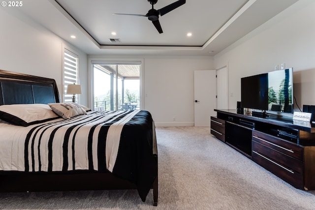 967 S 66th Pl, Springfield, OR 97478 - carpeted bedroom featuring a tray ceiling, ceiling fan, and recessed lighting
