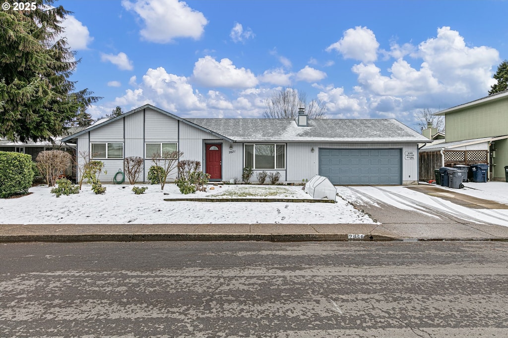 view of front of property with a garage