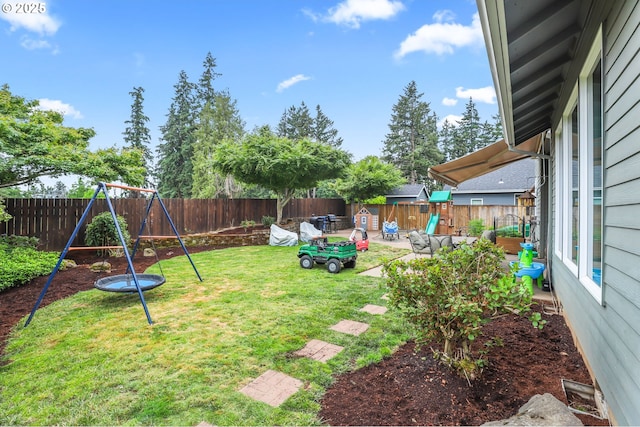 1393 NE 11th Ave, Canby, OR 97013 - fenced backyard featuring a playground, a patio, and outdoor lounge area
