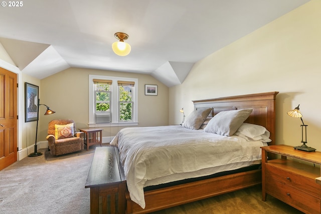 bedroom featuring vaulted ceiling, carpet floors, and baseboards