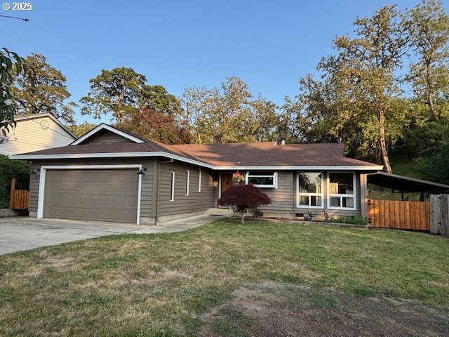 610 SE Maple St, Oakland, OR 97462 - ranch-style home featuring an attached garage and concrete driveway