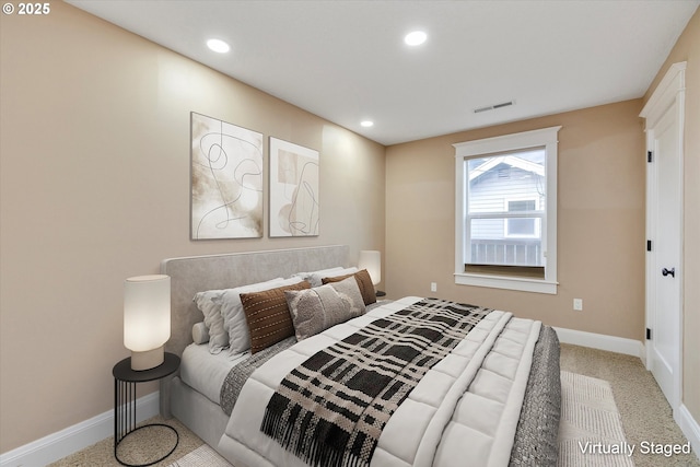 carpeted bedroom featuring recessed lighting, baseboards, and visible vents