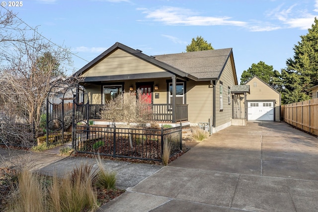 bungalow-style home with driveway, a fenced front yard, roof with shingles, covered porch, and a garage