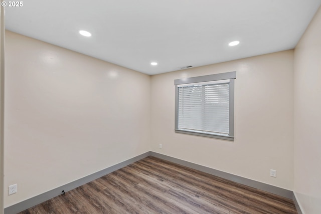 empty room featuring hardwood / wood-style floors