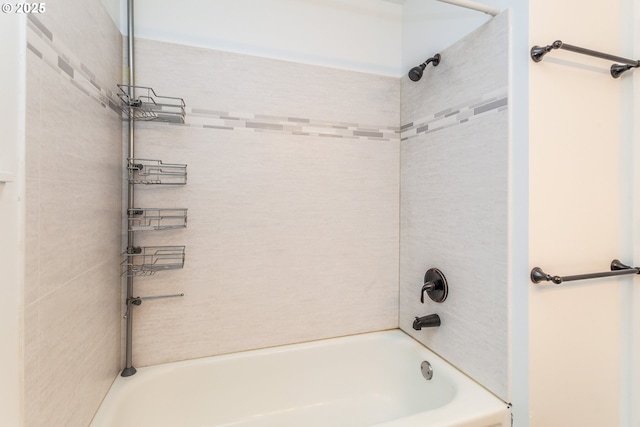 bathroom with shower / bathing tub combination