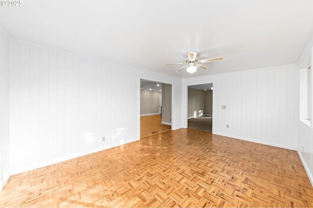 unfurnished room featuring ceiling fan