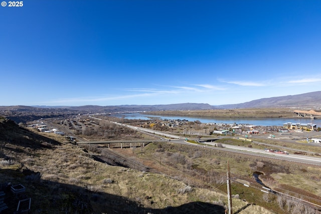 view of mountain feature featuring a water view