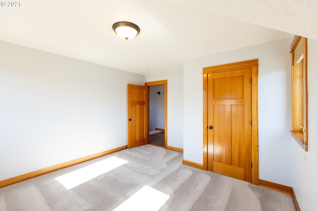 371 Summit Ridge Dr, The Dalles, OR 97058 - unfurnished bedroom with baseboards, carpet, and a closet