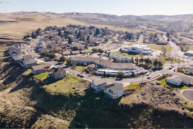 birds eye view of property featuring a residential view and a mountain view