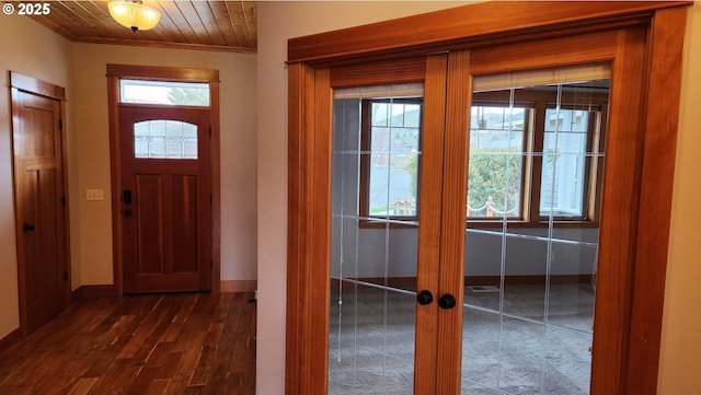 371 Summit Ridge Dr, The Dalles, OR 97058 - foyer entrance featuring wooden ceiling, baseboards, dark wood-type flooring, and ornamental molding