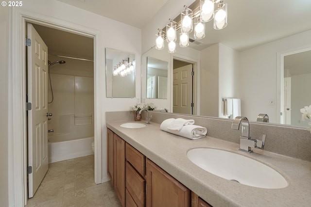 full bathroom featuring vanity, toilet, and bathing tub / shower combination