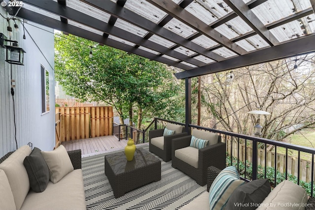 wooden deck featuring outdoor lounge area and a pergola