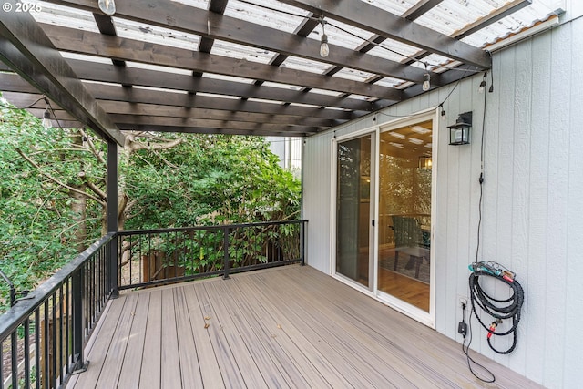 wooden terrace with a pergola