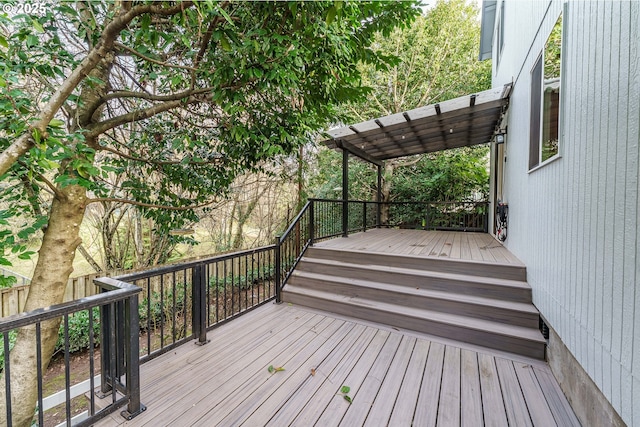 wooden terrace with a pergola