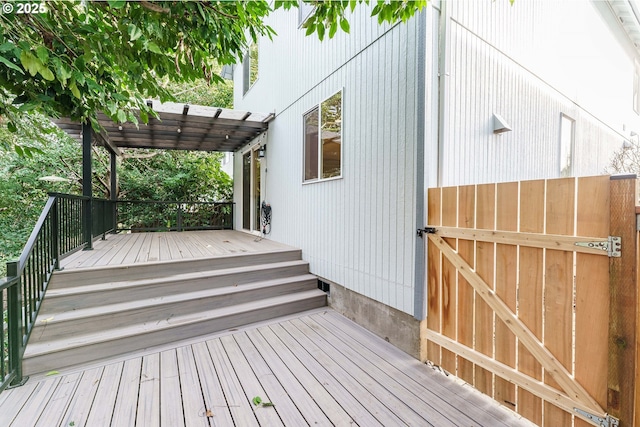 wooden deck featuring a pergola