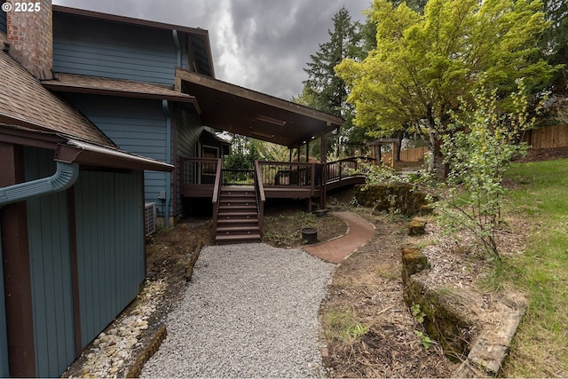 6765 SW 153rd Ave, Beaverton, OR 97007 - wooden deck with a fenced backyard