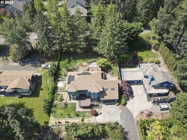 birds eye view of property with a residential view