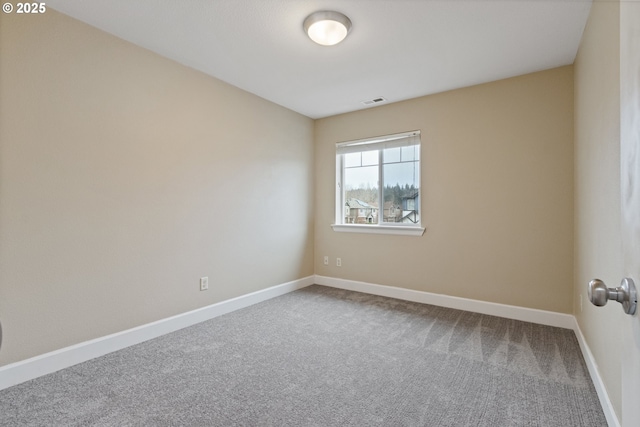 view of carpeted spare room